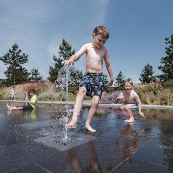 Children playing in fountains